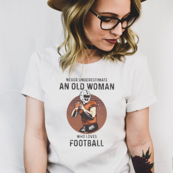 Never underestimate an old woman who loves football hoodie, sweater, longsleeve, shirt v-neck, t-shirt