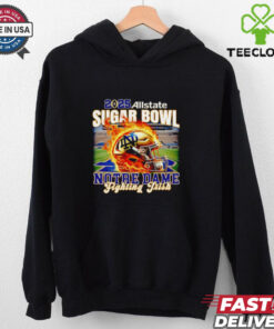 2025 Allstate Sugar Bowl Notre Dame Fighting Irish Fire Helmet Shirt, featuring a fiery graphic of the Notre Dame helmet and the Sugar Bowl logo. Perfect for fans celebrating the Fighting Irish’s appearance in the 2025 Sugar Bowl.
