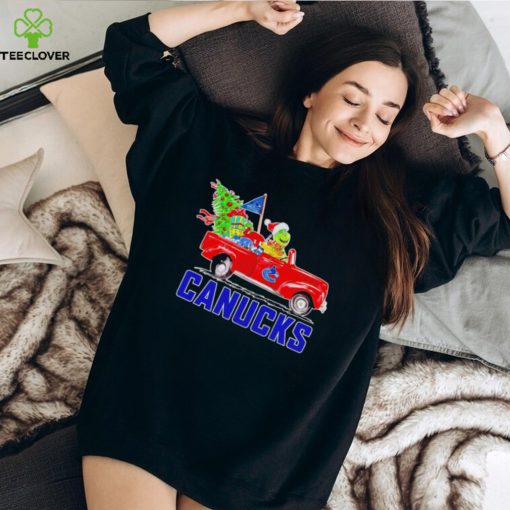 Happy Merry Christmas The Grinch drive a car Vancouver Canucks ice hockey logo flag gift hoodie, sweater, longsleeve, shirt v-neck, t-shirt