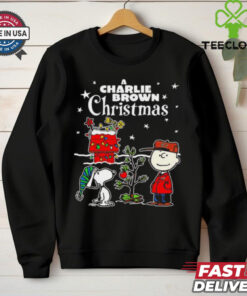 A Charlie Brown Christmas Snoopy Xmas Cartoon Shirt festive holiday design featuring Snoopy from the classic *A Charlie Brown Christmas* cartoon