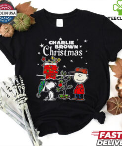 A Charlie Brown Christmas Snoopy Xmas Cartoon Shirt festive holiday design featuring Snoopy from the classic *A Charlie Brown Christmas* cartoon