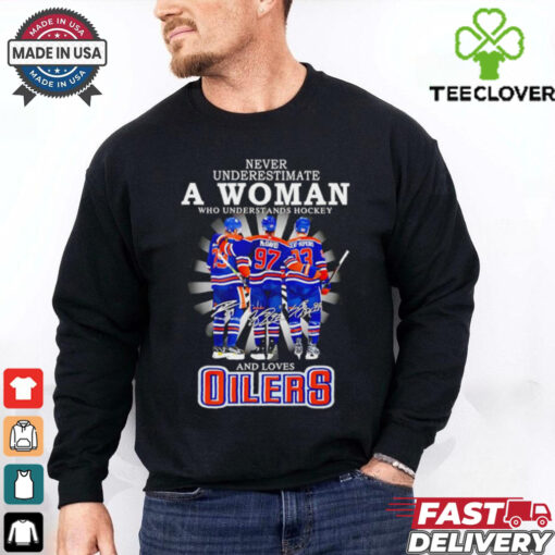 A woman who understands hockey and loves Oilers hockey shirt
