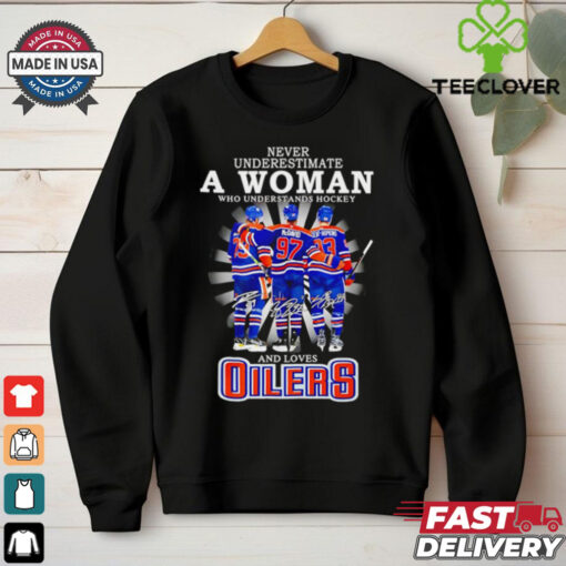 A woman who understands hockey and loves Oilers hockey shirt