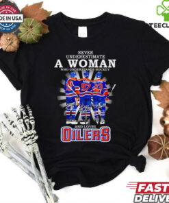 A Woman Who Understands Hockey and Loves Oilers Hockey Shirt, featuring a bold design combining a passion for hockey with support for the Edmonton Oilers. Perfect for female fans who are dedicated to the game and proudly support the Oilers.