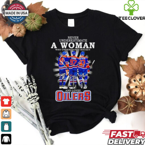 A woman who understands hockey and loves Oilers hockey shirt