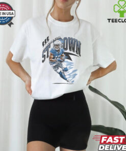 Amon-Ra St. Brown Detroit Lions NFL Football Retro Vintage Shirt, showcasing a classic, retro design that highlights Amon-Ra St. Brown's name and his impact on the Detroit Lions. Featuring vintage-inspired graphics, this shirt is perfect for fans who want to represent one of the Lions' standout players with a nostalgic, stylish look.