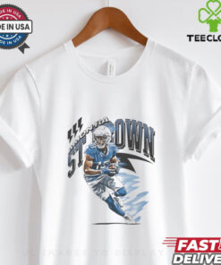 Amon-Ra St. Brown Detroit Lions NFL Football Retro Vintage Shirt, showcasing a classic, retro design that highlights Amon-Ra St. Brown's name and his impact on the Detroit Lions. Featuring vintage-inspired graphics, this shirt is perfect for fans who want to represent one of the Lions' standout players with a nostalgic, stylish look.