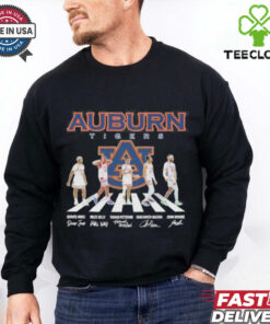 The **Auburn Tigers Men’s Basketball Abbey Road 2025 Shirt** features a creative design inspired by the iconic Abbey Road album cover, with Auburn Tigers basketball players in place of The Beatles. A unique and stylish way for fans to support their team in the 2025 season!