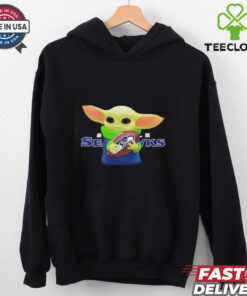 Baby Yoda holding Seattle Seahawks football shirt