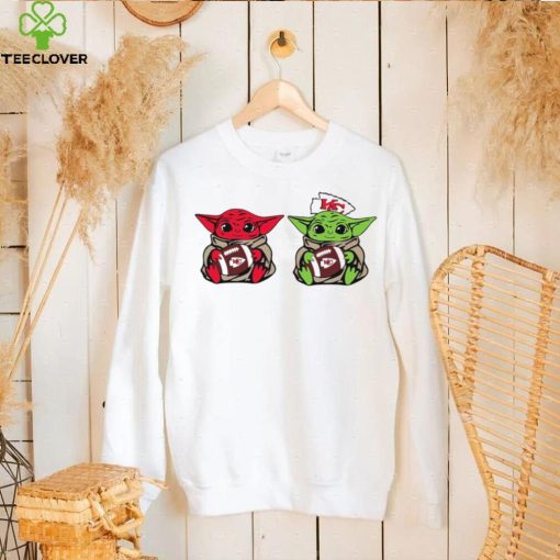 Baby Yoda hug the ball Kansas City Chiefs football logo hoodie, sweater, longsleeve, shirt v-neck, t-shirt