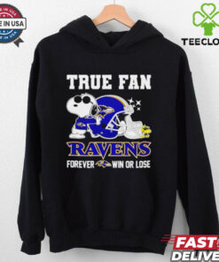 The **Baltimore Ravens True Fan Forever Win or Lose Snoopy Shirt** features a design with the iconic Snoopy character, symbolizing unwavering support for the Ravens, no matter the outcome. A perfect shirt for fans who proudly support their team through every victory and defeat!