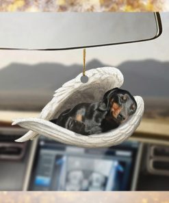 Black and tan dachshund sleeping angel ornament