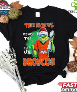 Broncos Super Bowl Christmas Grinch They Hate Us Because They Ain't Us Shirt featuring a playful Grinch design with a bold statement celebrating the Denver Broncos' Super Bowl pride and confidence.