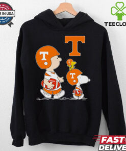 Charlie Brown and Snoopy walking Tennessee Volunteers football shirt
