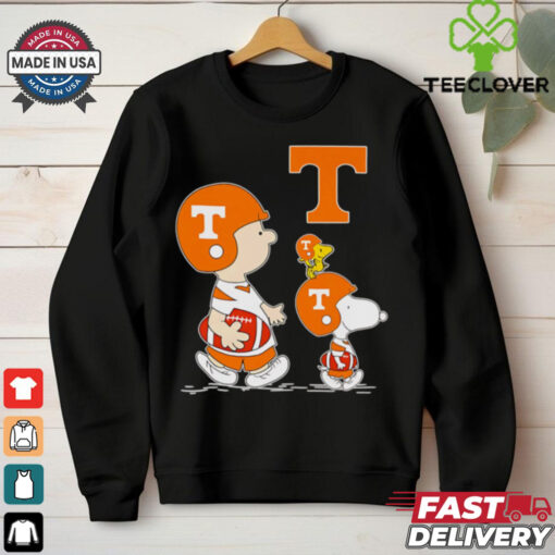 Charlie Brown and Snoopy walking Tennessee Volunteers football shirt