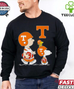 Charlie Brown and Snoopy walking Tennessee Volunteers football shirt