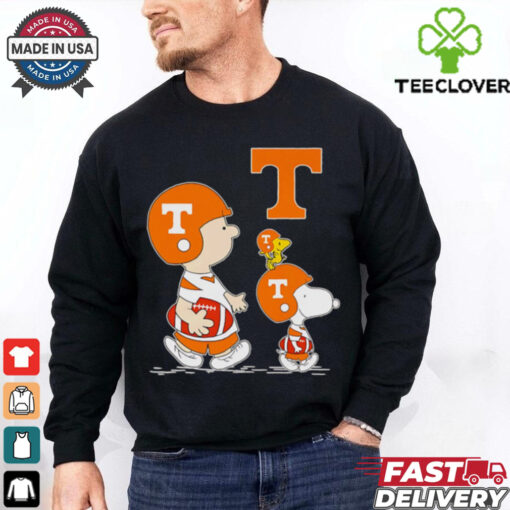 Charlie Brown and Snoopy walking Tennessee Volunteers football shirt