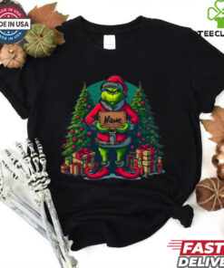 Customized Name for Christmas Grinch Shirt featuring a fun and personalized design with the Grinch, allowing you to add your name for a unique holiday-themed shirt.