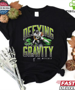 D.K. Metcalf Seattle Seahawks defying gravity hurdle signature shirt