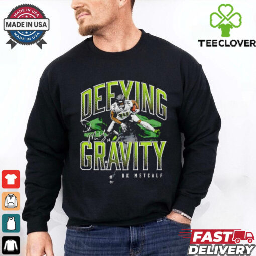 D.K. Metcalf Seattle Seahawks defying gravity hurdle signature shirt