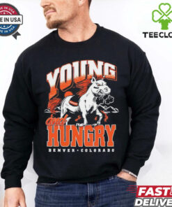 The **Denver Broncos Young and Hungry Shirt** captures the energy and determination of the team, highlighting the fresh talent eager to make an impact. A perfect shirt for fans to support the next generation of Broncos players!