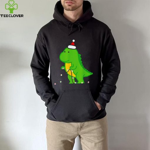 Dinosaur putting up string lights Christmas hoodie, sweater, longsleeve, shirt v-neck, t-shirt