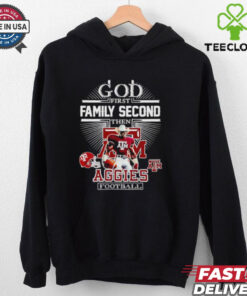 God First, Family Second, Then Aggies Football Mascot Shirt, featuring a faith-based design with the Texas A&M Aggies football mascot. Perfect for fans who prioritize faith, family, and their support for the Aggies.