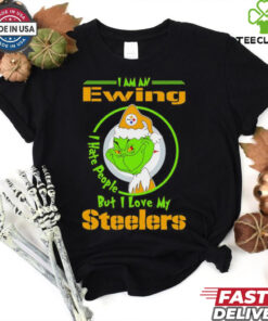 Grinch Christmas I Am An Ewing I Love My Pittsburgh Steelers Shirt featuring a festive design with a playful Grinch theme, expressing loyalty to the Pittsburgh Steelers.