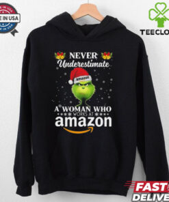 Grinch Never Underestimate A Woman Who Works At Amazon Christmas 2024 Shirt