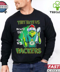 Grinch Packers Super Bowl Christmas They Hate Us Because They Ain't Us Shirt featuring a playful Grinch design and a bold statement celebrating the Green Bay Packers' Super Bowl pride.