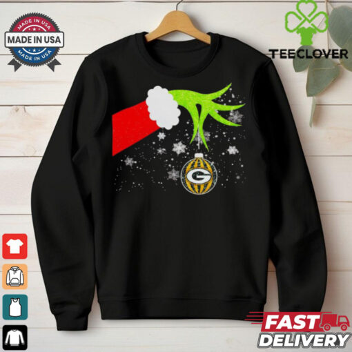 Grinch hand holding ornament Packers football Christmas hoodie, sweater, longsleeve, shirt v-neck, t-shirt