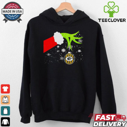 Grinch hand holding ornament Packers football Christmas hoodie, sweater, longsleeve, shirt v-neck, t-shirt