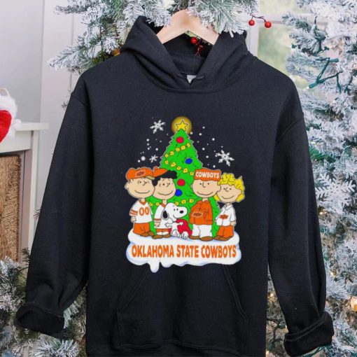 Happy Merry Christmas Peanuts Christmas tree Oklahoma State Cowboys football logo gift hoodie, sweater, longsleeve, shirt v-neck, t-shirt