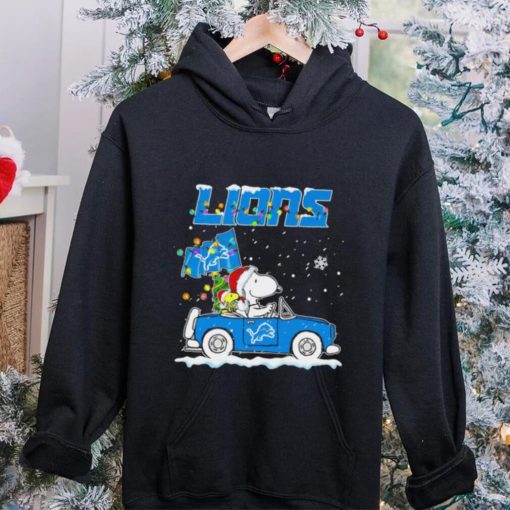 Happy Merry Christmas Snoopy drive a car Detroit Lions logo flag gift hoodie, sweater, longsleeve, shirt v-neck, t-shirt