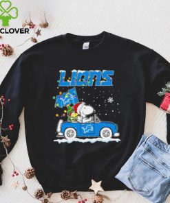 Happy Merry Christmas Snoopy drive a car Detroit Lions logo flag gift hoodie, sweater, longsleeve, shirt v-neck, t-shirt