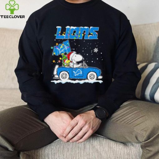 Happy Merry Christmas Snoopy drive a car Detroit Lions logo flag gift hoodie, sweater, longsleeve, shirt v-neck, t-shirt