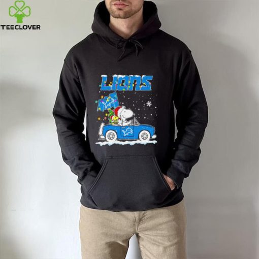 Happy Merry Christmas Snoopy drive a car Detroit Lions logo flag gift hoodie, sweater, longsleeve, shirt v-neck, t-shirt