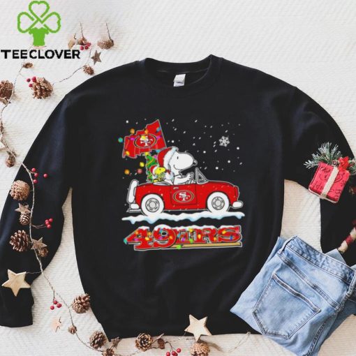 Happy Merry Christmas Snoopy drive a car San Francisco 49ers logo flag gift hoodie, sweater, longsleeve, shirt v-neck, t-shirt