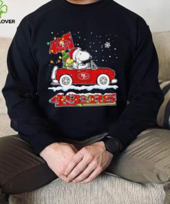 Happy Merry Christmas Snoopy drive a car San Francisco 49ers logo flag gift hoodie, sweater, longsleeve, shirt v-neck, t-shirt