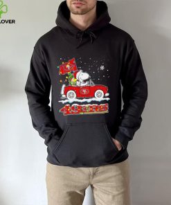 Happy Merry Christmas Snoopy drive a car San Francisco 49ers logo flag gift hoodie, sweater, longsleeve, shirt v-neck, t-shirt