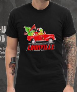 Happy Merry Christmas The Grinch drive a car Louisville Cardinals football logo flag gift hoodie, sweater, longsleeve, shirt v-neck, t-shirt