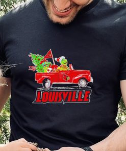 Happy Merry Christmas The Grinch drive a car Louisville Cardinals football logo flag gift hoodie, sweater, longsleeve, shirt v-neck, t-shirt