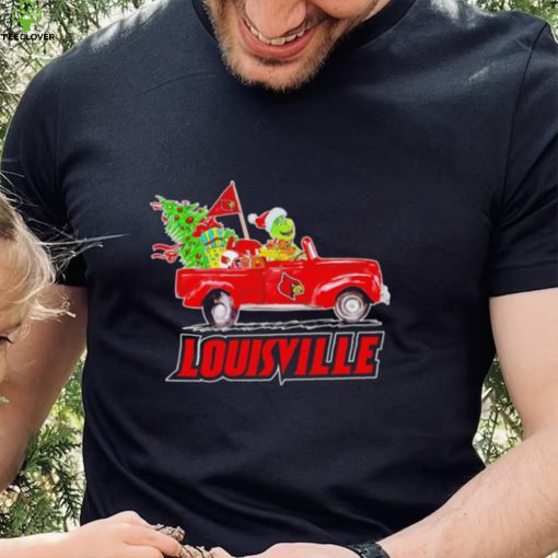 Happy Merry Christmas The Grinch drive a car Louisville Cardinals football logo flag gift hoodie, sweater, longsleeve, shirt v-neck, t-shirt