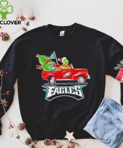 Happy Merry Christmas The Grinch drive a car Philadelphia Eagles football logo flag gift hoodie, sweater, longsleeve, shirt v-neck, t-shirt