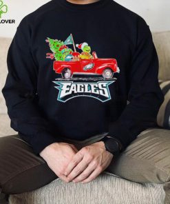 Happy Merry Christmas The Grinch drive a car Philadelphia Eagles football logo flag gift hoodie, sweater, longsleeve, shirt v-neck, t-shirt