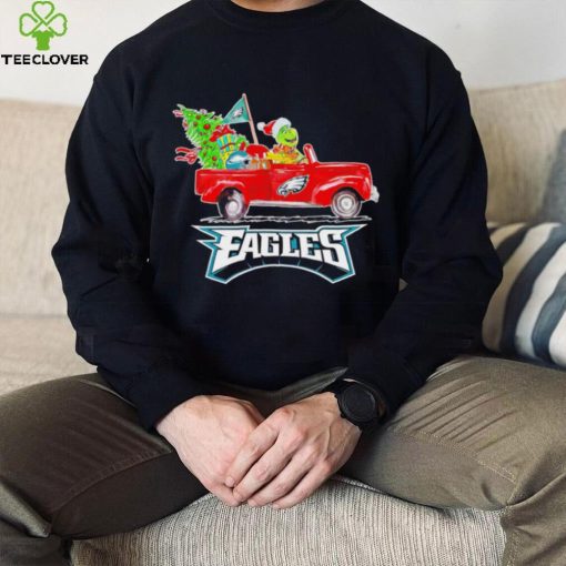 Happy Merry Christmas The Grinch drive a car Philadelphia Eagles football logo flag gift hoodie, sweater, longsleeve, shirt v-neck, t-shirt