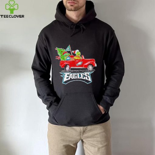 Happy Merry Christmas The Grinch drive a car Philadelphia Eagles football logo flag gift hoodie, sweater, longsleeve, shirt v-neck, t-shirt