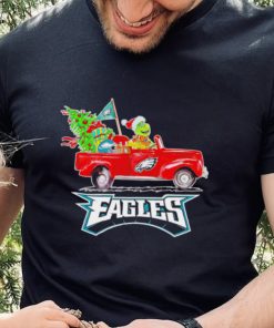 Happy Merry Christmas The Grinch drive a car Philadelphia Eagles football logo flag gift hoodie, sweater, longsleeve, shirt v-neck, t-shirt