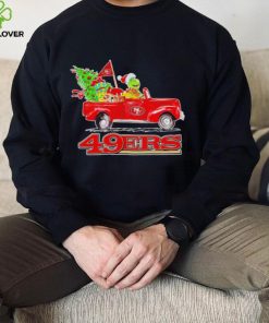 Happy Merry Christmas The Grinch drive a car San Francisco 49ers football logo flag gift hoodie, sweater, longsleeve, shirt v-neck, t-shirt