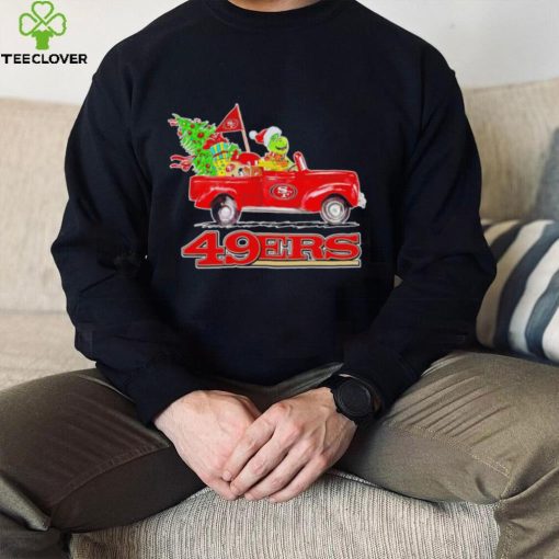 Happy Merry Christmas The Grinch drive a car San Francisco 49ers football logo flag gift hoodie, sweater, longsleeve, shirt v-neck, t-shirt